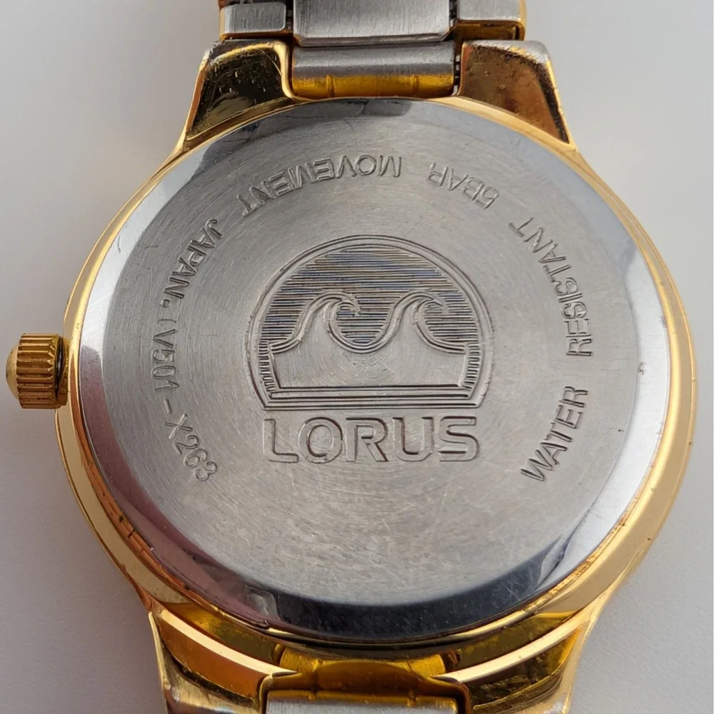 Lorus V501-X263 Women's Gold Tone White Dial Roman Numeral Quartz Watch 24mm 7